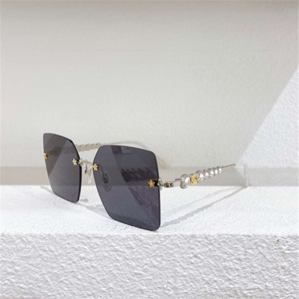 

Designer family crystal diamond star rivet mirror leg frameless Sunglasses big frame net Red gg0644s, White;black