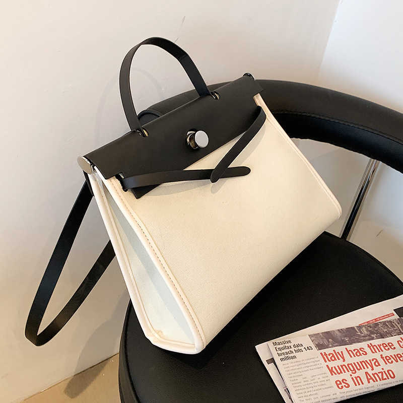 

Big female 2021 new Korean fashion contrast color messenger bag women's canvas texture one shoulder portable Tote Bag, Black with white