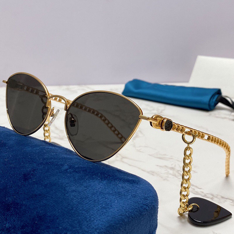 

Designer sunglasses 0977S fashion classic cat eye gold wire frame heart-shaped chain pendant ladies party holiday travel luxury glasses UV400 top quality with box
