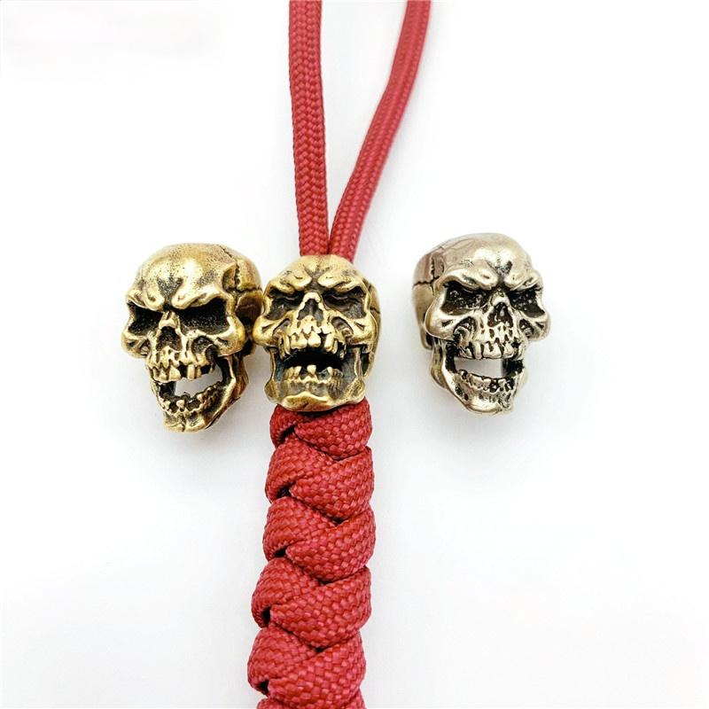 

Keychains Punk Brass Skull Knife Beads Umberalla Rope Bead White Copper Retro Face Paracord Car Hanging Pendant Gifts