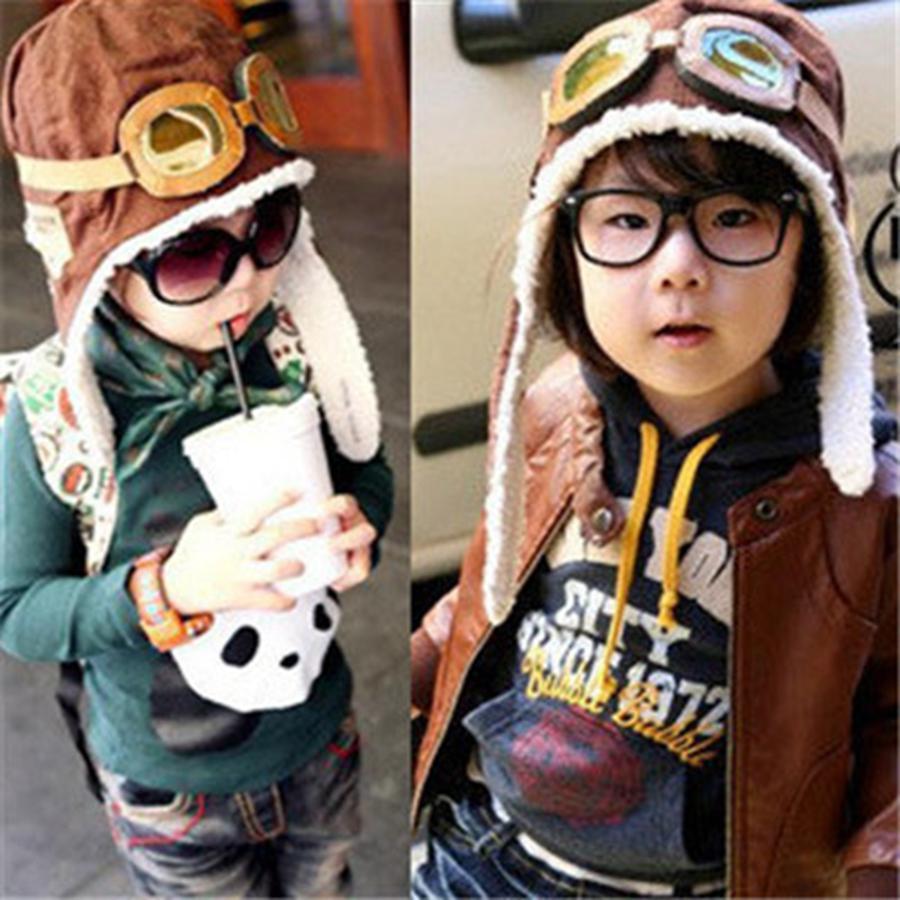

Free DHL Cute Baby Pilot Cap Fashion Toddler Winter Warm Beanie Hat Kids Earflap Skull Hats Outdoor Ski Caps