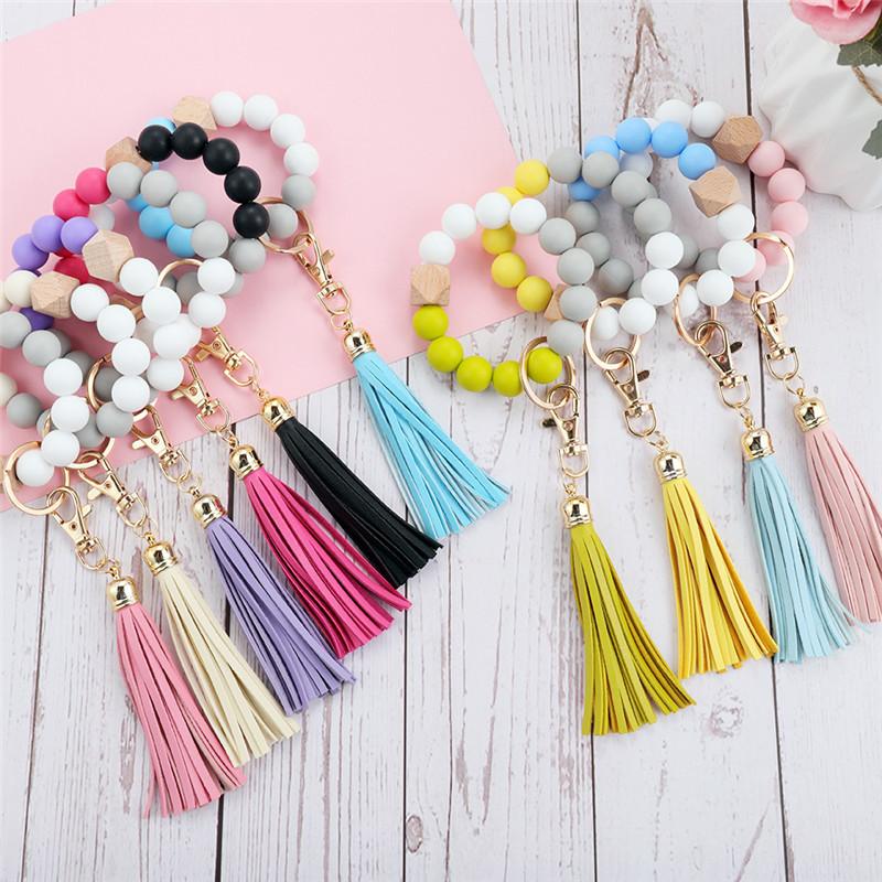 

Keychains 1pcs Silicone Wood Beads Keychain For Keys Wristlet Bracelet Pendant Keyring Women Tassel Charms Accessories