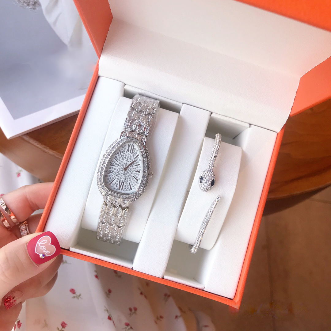 

Serpentine goddess fan inlaid crystal diamonds entire watch Same paragraph full diamond bracelet Two-piece suit, Gold