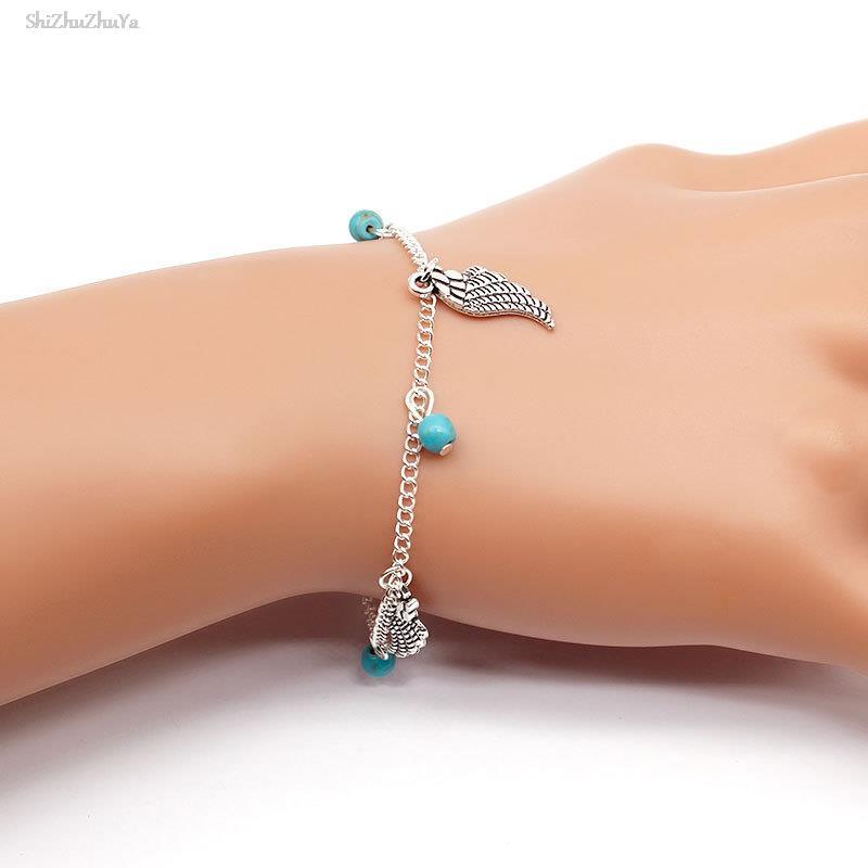 

Charm Bracelets Vintage Alloy Angel Feather Pendant Bracelet Gold Silver Simple Design Turquoise Bead Tassel Chain Ladies Party Accessories, Golden;silver