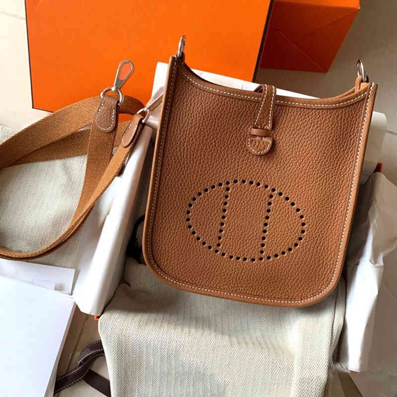 

2021 Autumn and Winter New Women's Bag Fashion One Shoulder Portable Hollow Out Leisure Bucket Bag Evelyn Top Cowhide Women's Bag Yue, Yellow