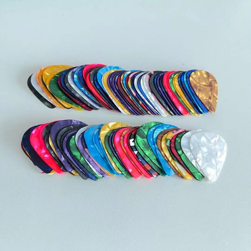

Guitar Picks Medium 0.71mm Celluloid Plectrums 100PCS/Lot Mixed Color Wholesale