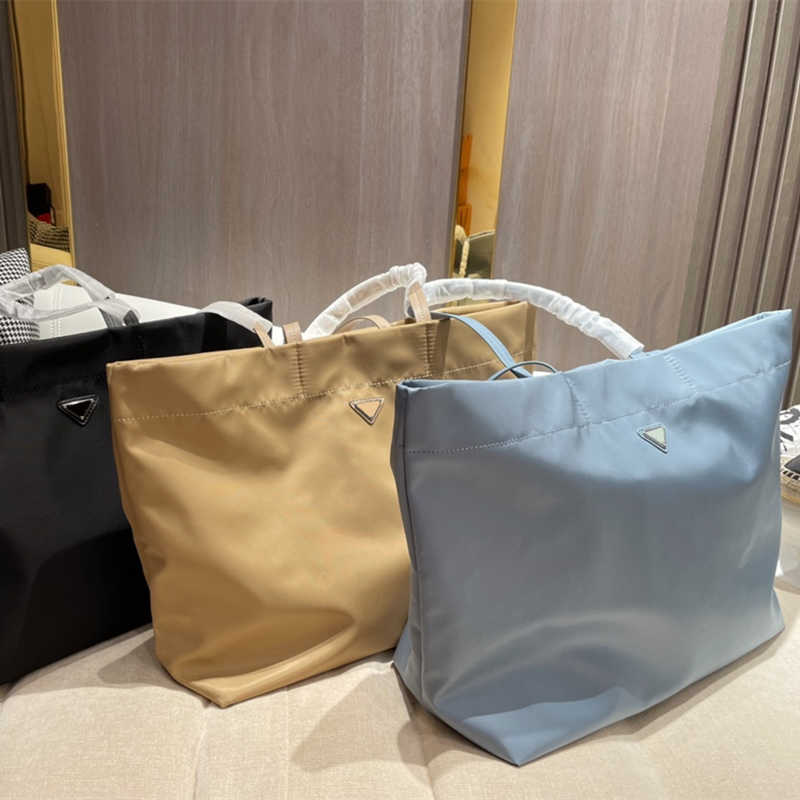 

2021 Tote Designer Bags Drawstring Bag Handbags Leather High-capacity Evening Party Shopping Business Occasions Two Colors With Exquisite Packaging