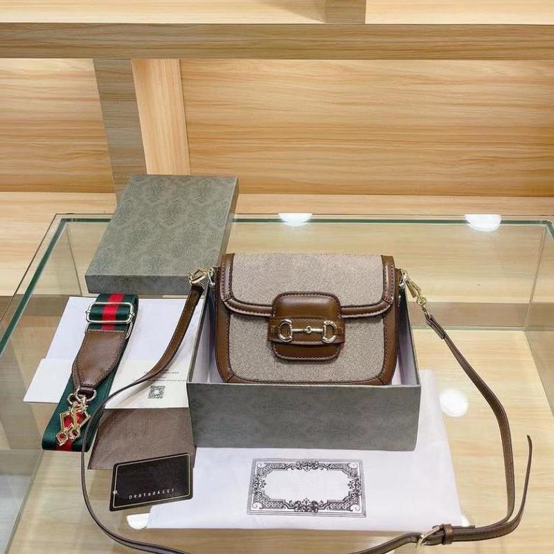 

A 1955 horsebit handbag three shoulder straps bag Classics of more than 60 years designer women luxurys designers pattern