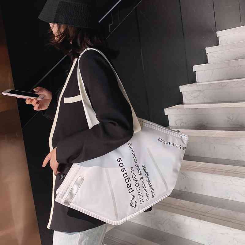 

2021 Thailand new creative mask modeling single shoulder large capacity fashion handbag trend, White