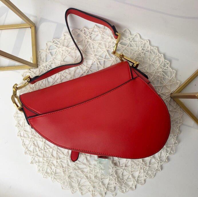 

Saddle bag Top quality Genuine Leather With shoulder strap Purse Metal pendant bags high women Crossbody Cowhide handbag