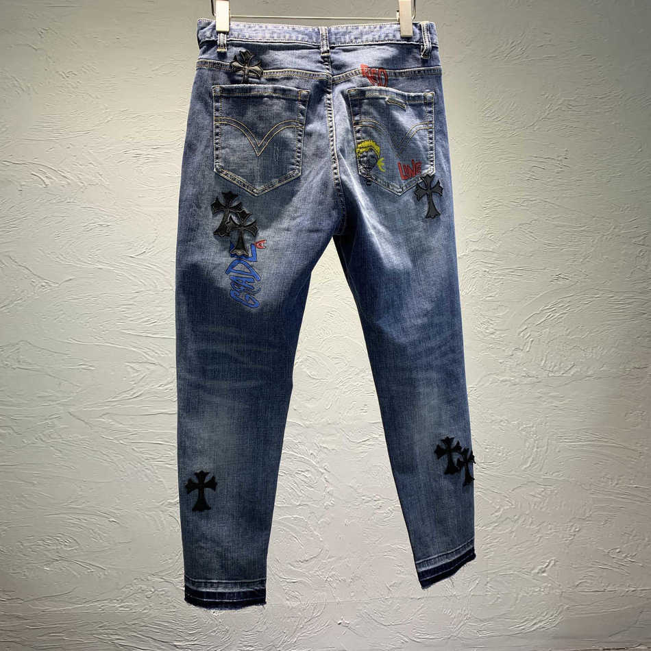 

Brand Designer Fashion Crosin Men's Pants Cross Skinned Sanskrit Graffiti Print Hole Versatile Jeans TXU3, Blue