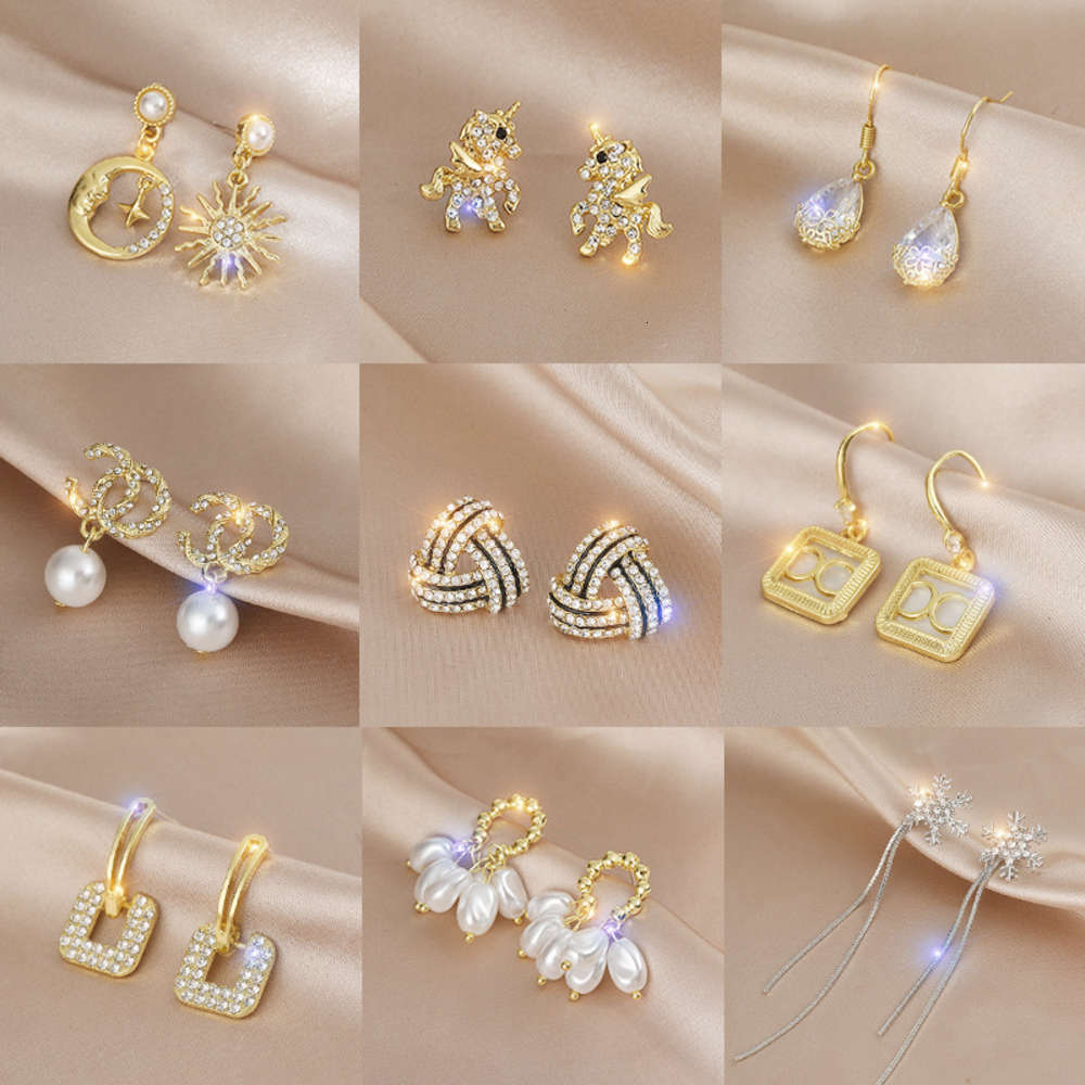 

earrings women's fashion Korean temperament net red personality long earrings design French Earrings, Golden