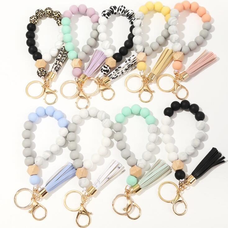

9 Colors Wooden Tassel Bead String Bracelet Keychain Food Grade Silicone Beads Bracelets Women Girl Keyring Wrist Strap
