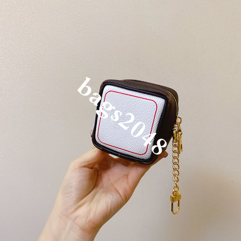 

Famous men women coin purses womens cute bag pendant mens high quality leather wallets, Red;black