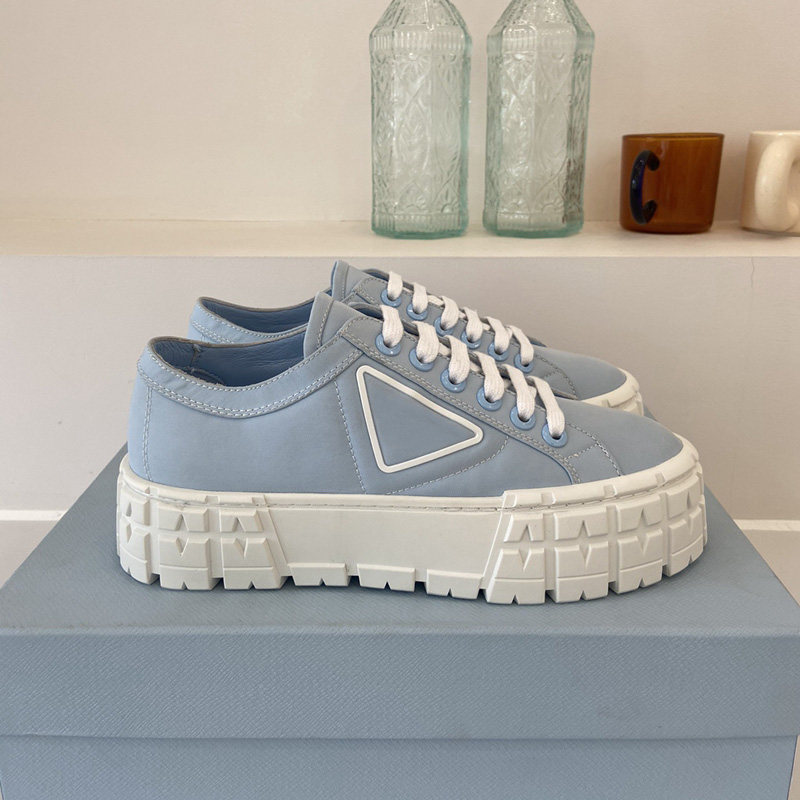 

With Box Double Wheel Nylon Gabardine Sneakers Women Casual Shoes Womens White Blue Desert Beige Platform Triangle Logo Sneaker Inspired By Motocross Tires Defines