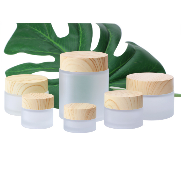 

Frosted Glass Jar Cream Bottles Round Cosmetic Jars Hand Face Packing Bottles 5g 50g Jars With Wood Grain Cover