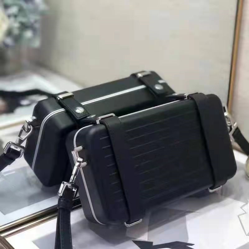 

Brand new AND RIMOW ladies fashion clutch bag luxury designer mini suitcase bow thread chain, Blue