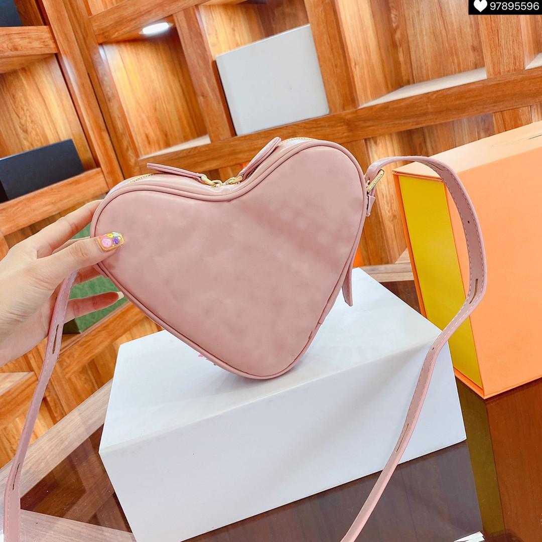 

2021 Luxury Women bags Pink Heart Purses Designers Mini Hearts Crossbody Lady Shoulder with Embossed Flowers High Quality L21071503