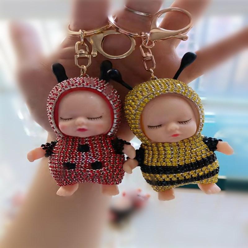 

Keychains Luxury Creative Rhinestone Sleeping Doll Keychain Fashion Punk Animal Keyring For Woman Car Bag Pendant Key Chains Couple Gift