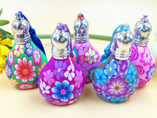 

100pcs/lot Free Shipping Flower sytle 5ml 8ml 10ML Roll on Ball Refillable Ceramic essence oil empty polymer clay Perfume bottle