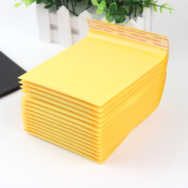 

Wholesale- 5 PCS/lot 110*130mm Kraft Paper Bubble Envelopes Bags Mailers Padded Shipping Envelope With Bubble Mailing Bag Business Supplies