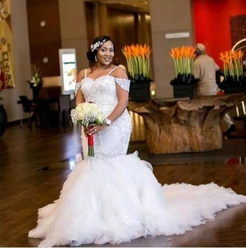 

2018 African Plus Size Wedding Dresses Spaghetti Straps Lace Appliques Beaded Cap Sleeves Mermaid Wedding Dress Tiered Tulle Bridal Gowns, Ivory