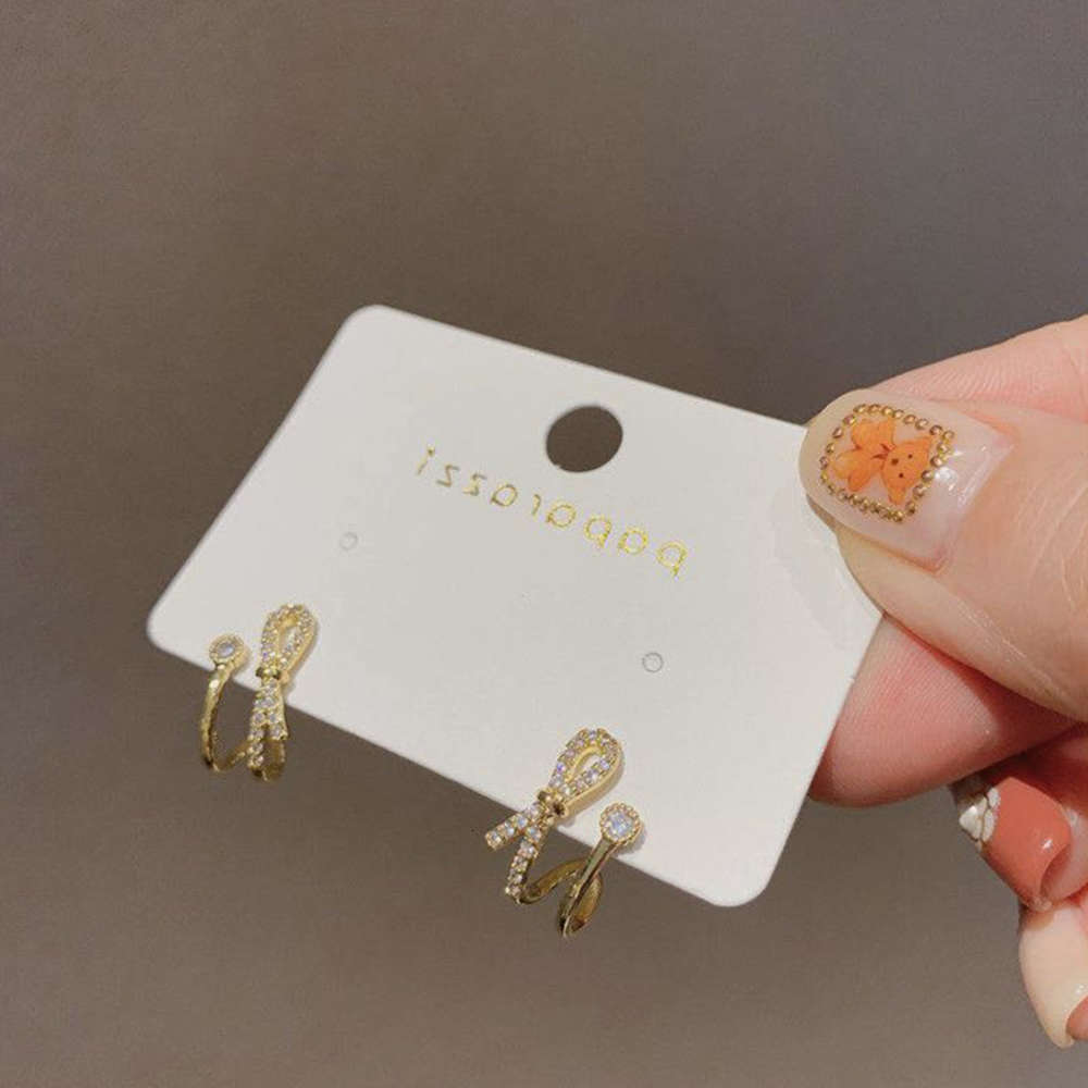

Korean bowknot micro inlaid Zircon Earrings S925 silver needle luxury temperament fashion versatile metal style small earrings