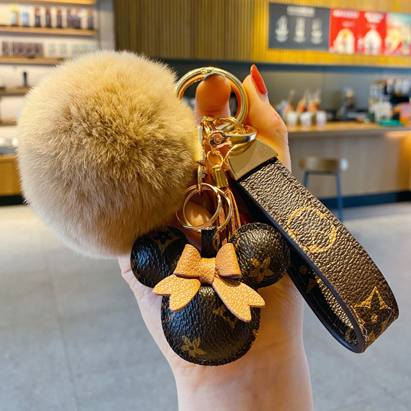 

Fashion Cartoon Keychain Cute Mouse Designer Key Chain Buckle Brown Flower Party Favor PU Leather Keyring Lovers Car Pendant Handbag Bags Accessories