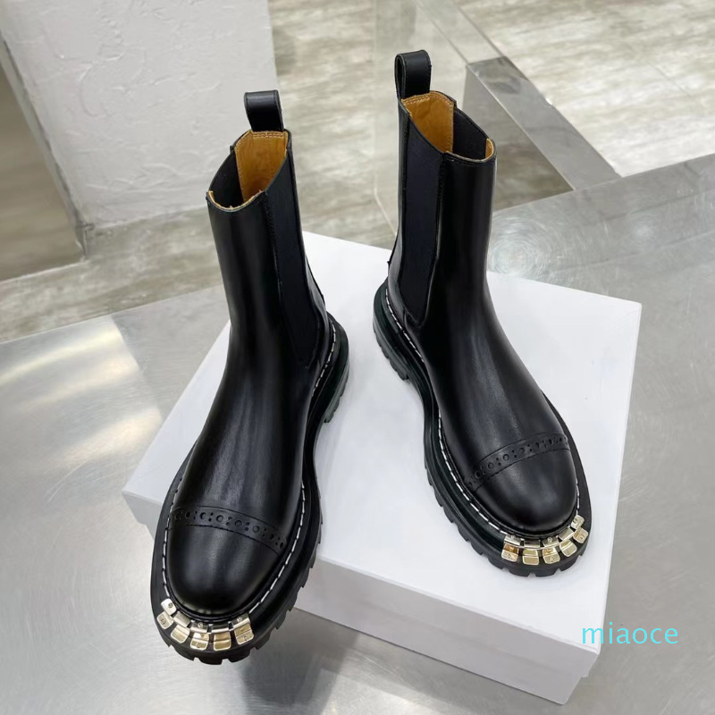 

designers shoes Black Elasticated chunky platform biker ankle boots leather Martin booties with notched sole heavy duty luxury