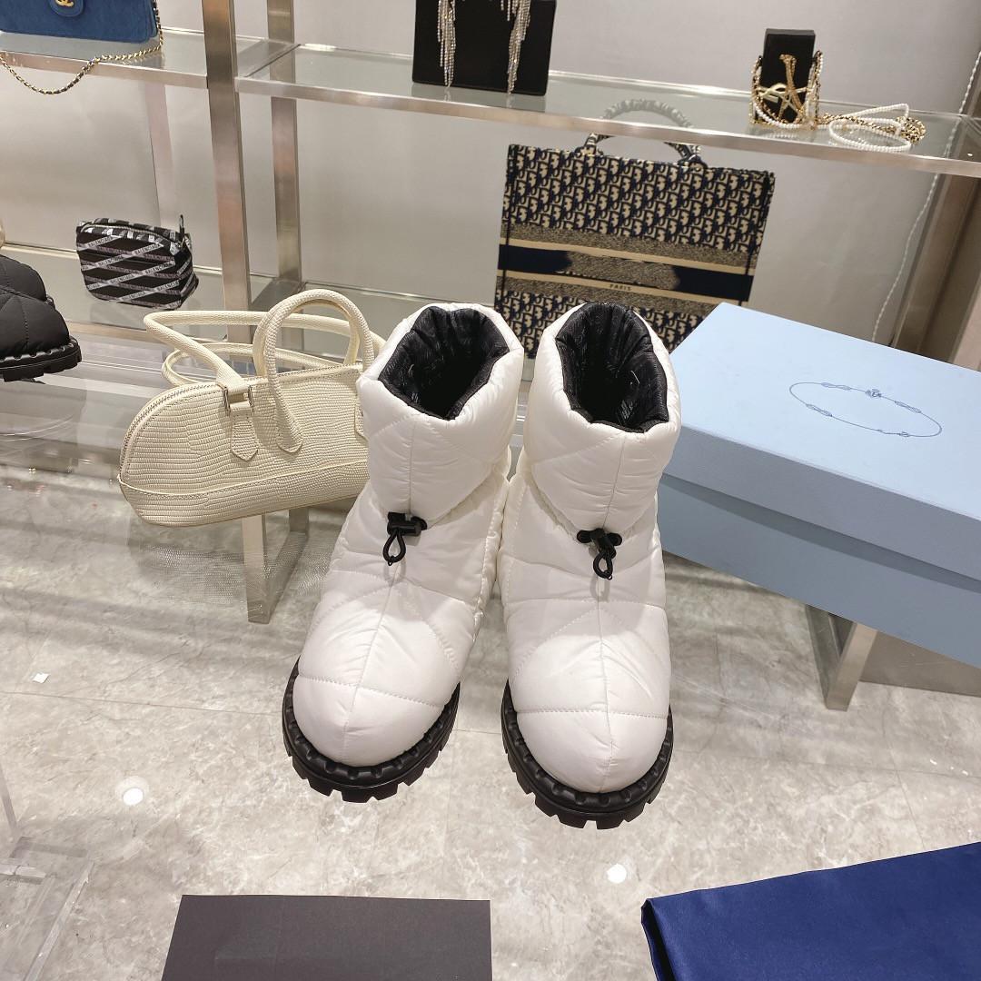 

Quilted nylon snow boots overshoe sports wind harness rope opening and closing design embossed rubber triangle logo high top size 35-41, White