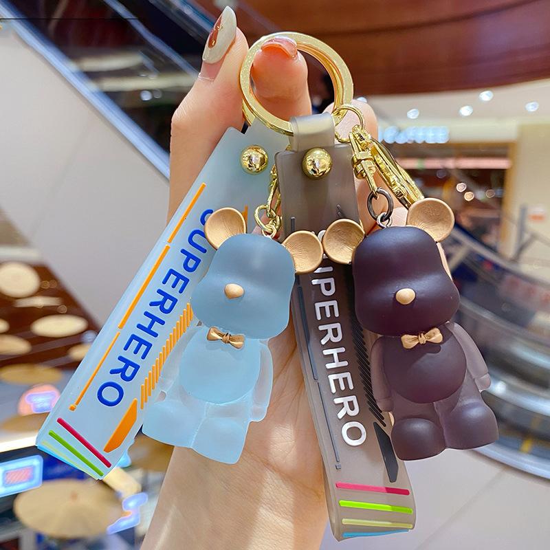 

Keychains Cute Transparent Crystal Bow Tie Bear Keychain Creative Resin Doll Key Chain Wrist Rope Keyring Couple Bag Charm Pendant Gift
