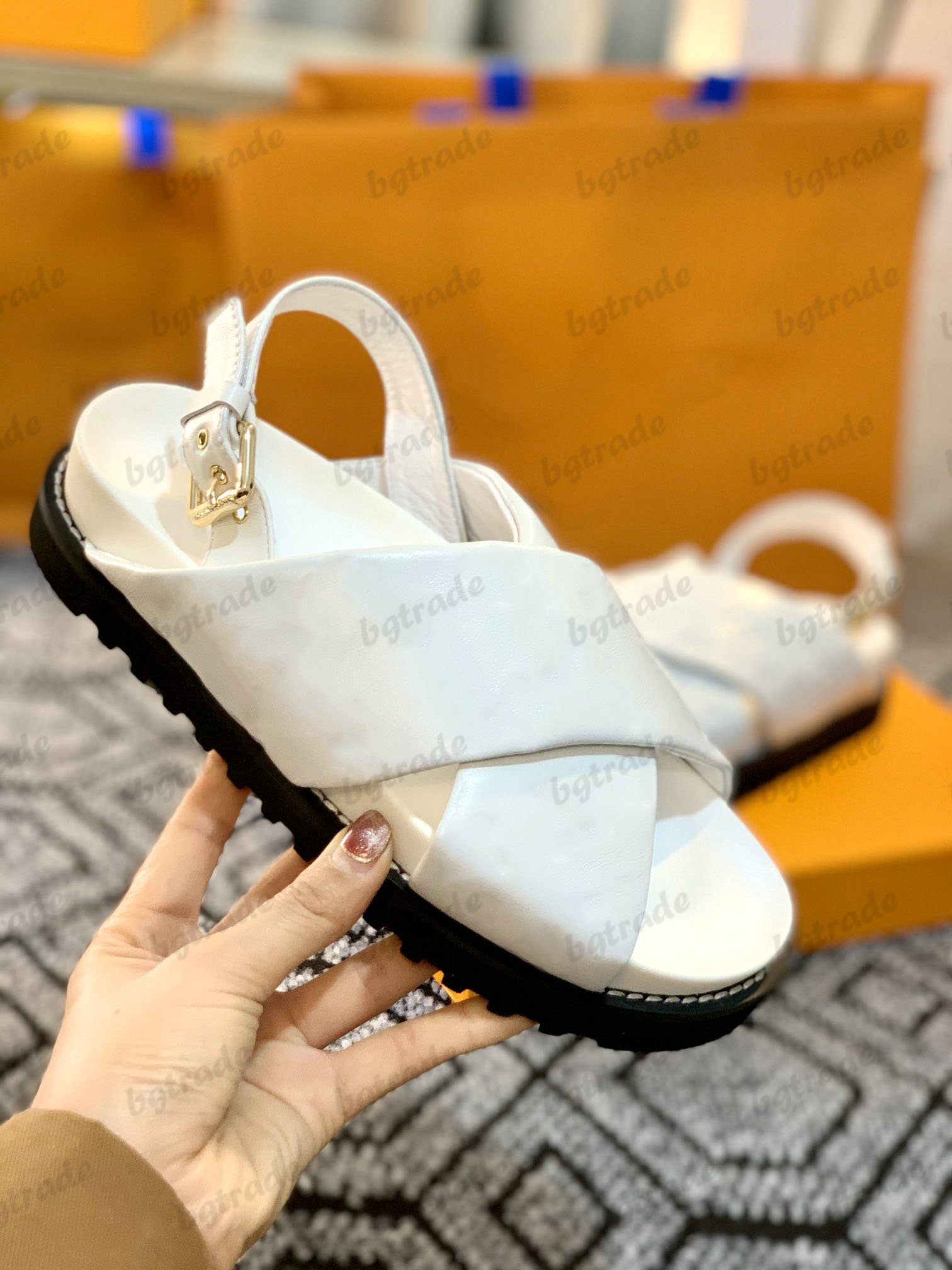 

PASEO FLAT COMFORT SANDAL Designer 2 Crossover Straps Padded Lambskin Embossed Monograms Womens Sandals With engraved buckle lightweight rubber outsole