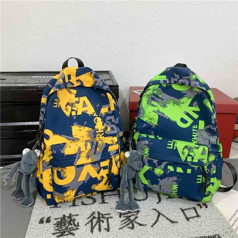 

Schoolbag male Korean version capacity junior high school students trend backpack female computer bag, Orange pendant plus 4.5 yuan