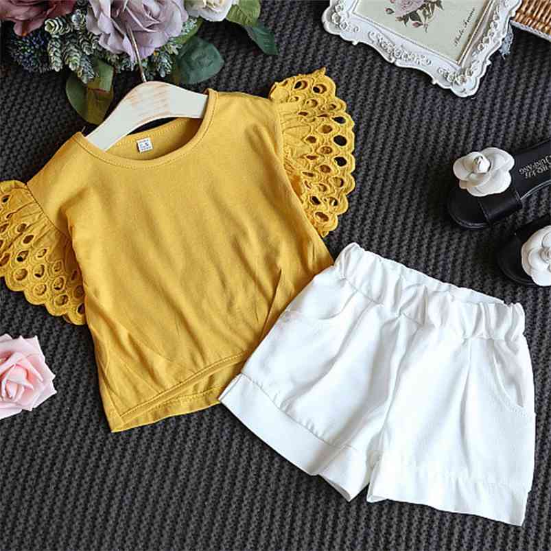

Arrivals Summer Children Sets Hollow Out Sleeve Yellow Solid T-Shirt White Shorts 2Pcs Girls Clothes 2-7T 210629