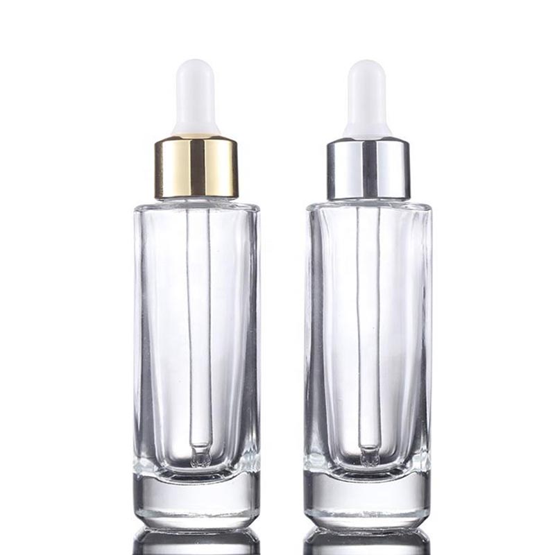 

Empty clear 15ml 30ml 50ml facial eye serum bottles flat shoulder dropper glass bottle with gold silver lid