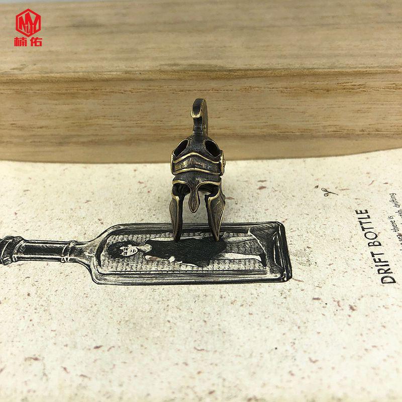 

Brass Knife Bead Warrior Helmet Paracord Pendant Outdoor Gadgets