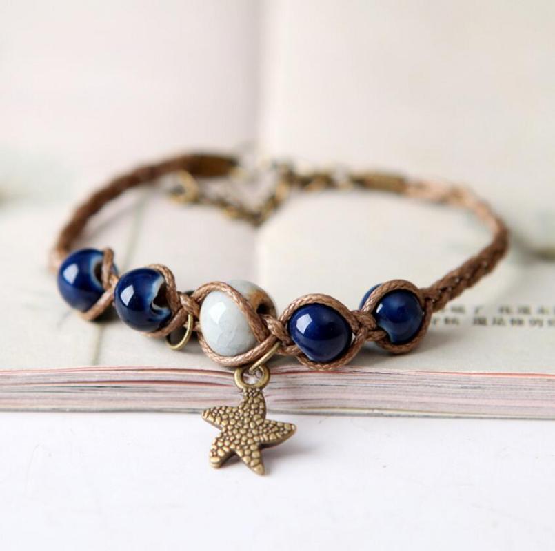 

Charm Bracelets Vintage Bronze Star Starfish Bell Bracelet Ceramics Crack Glaze Beads Brown Wax Cord Braided Bohemia Jewelry