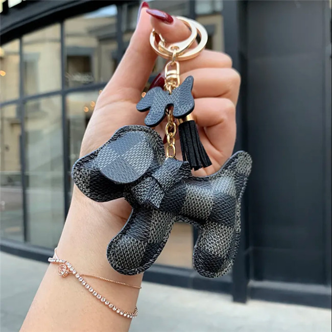 

Luxury high-end leather key ring female creative dog car European and2021 American personality lovers backpack pendant, Silver