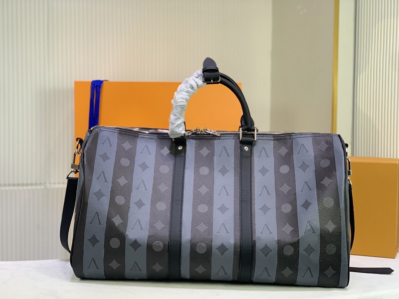 

Designer men and women Duffel bag luggage luxury canvas leather high-volume fashion european-american style shoulder back 50-29-23cm M40567