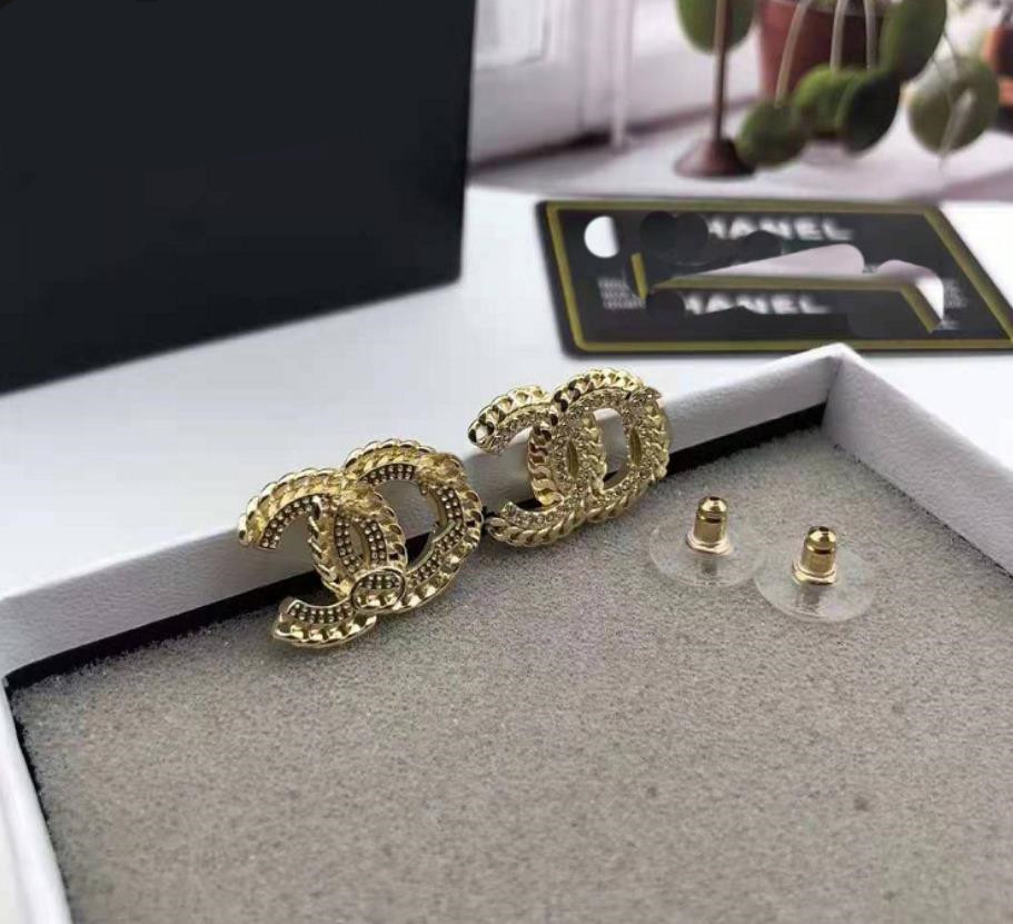 

Europe and America 2021 small fragrance Feng Shui diamond twist Earrings Europe and America fashion crossing Gold Earrings 925 silver needle Earrings