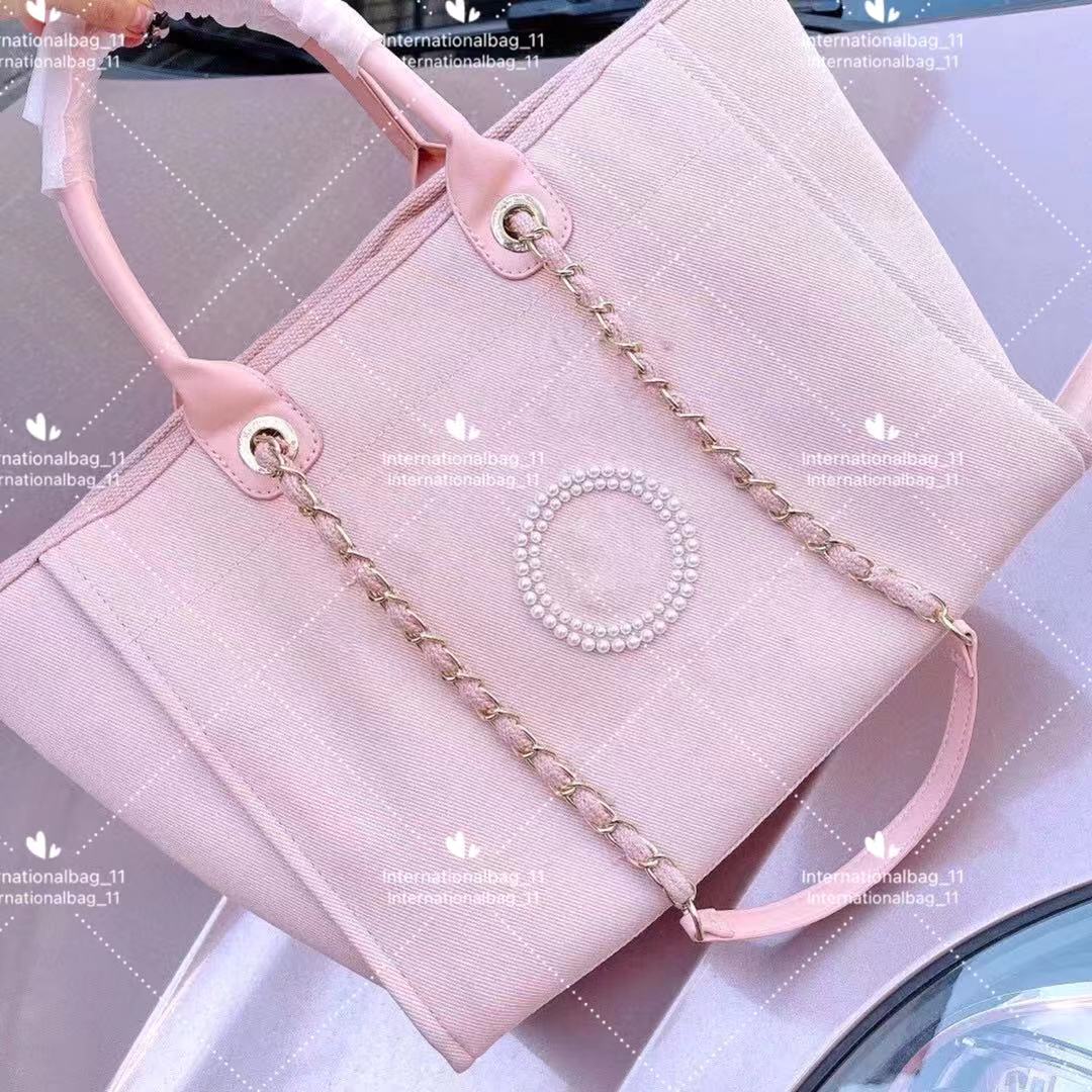 

2021 Fashion beach tote bags designer lady pearl canvas shopping bag design large capacity one shoulder four color