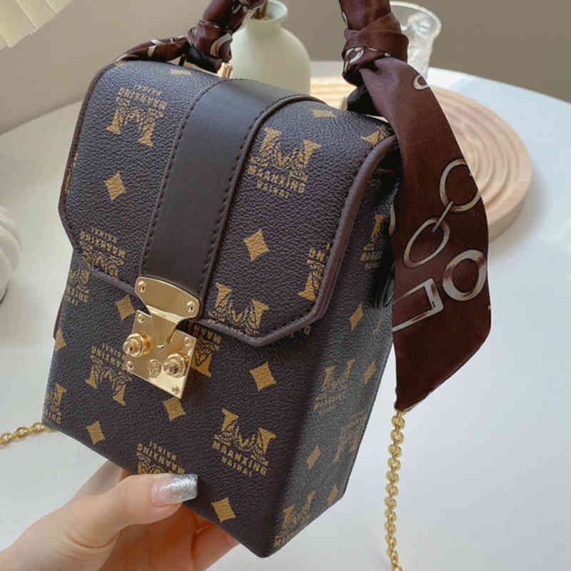 

Discount signature chain wind silk scarf shaped portable vertical lock small box bag Handbags, Brown