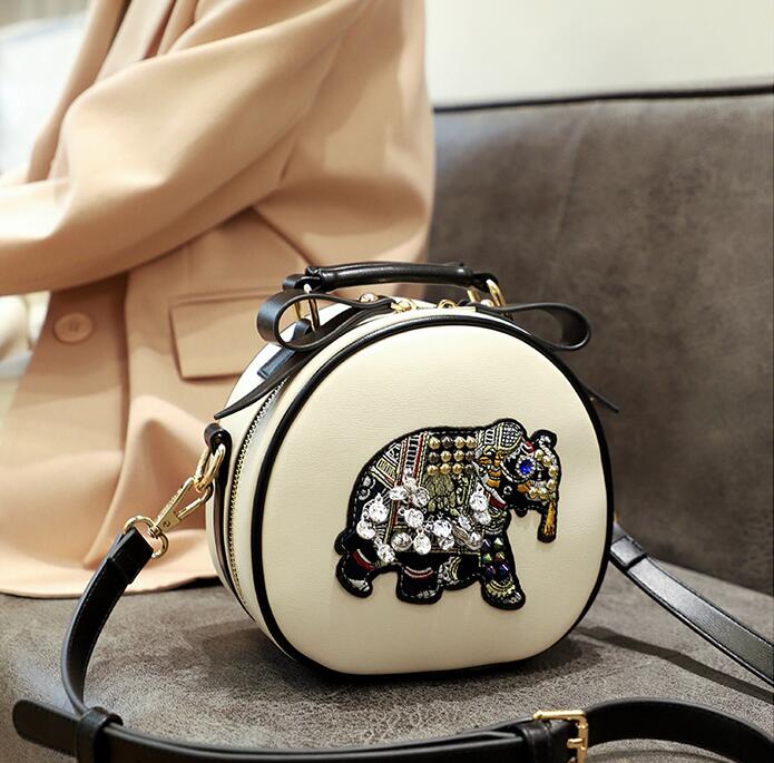 

Factory wholesale brand women shoulder bag sweet round elephant cartoon leather handbag street trend sequin embroidery messenger bags personality rivet handbags