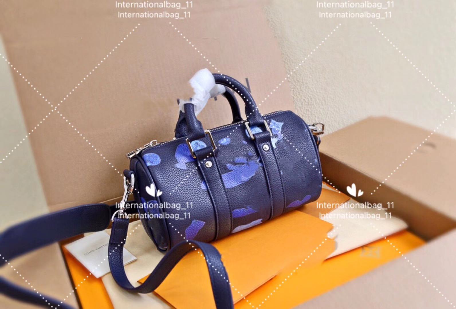 

Luxury designer shopping bags dark blue fashion leather printing high quality handheld recreational style all his luggage tote pillow pack