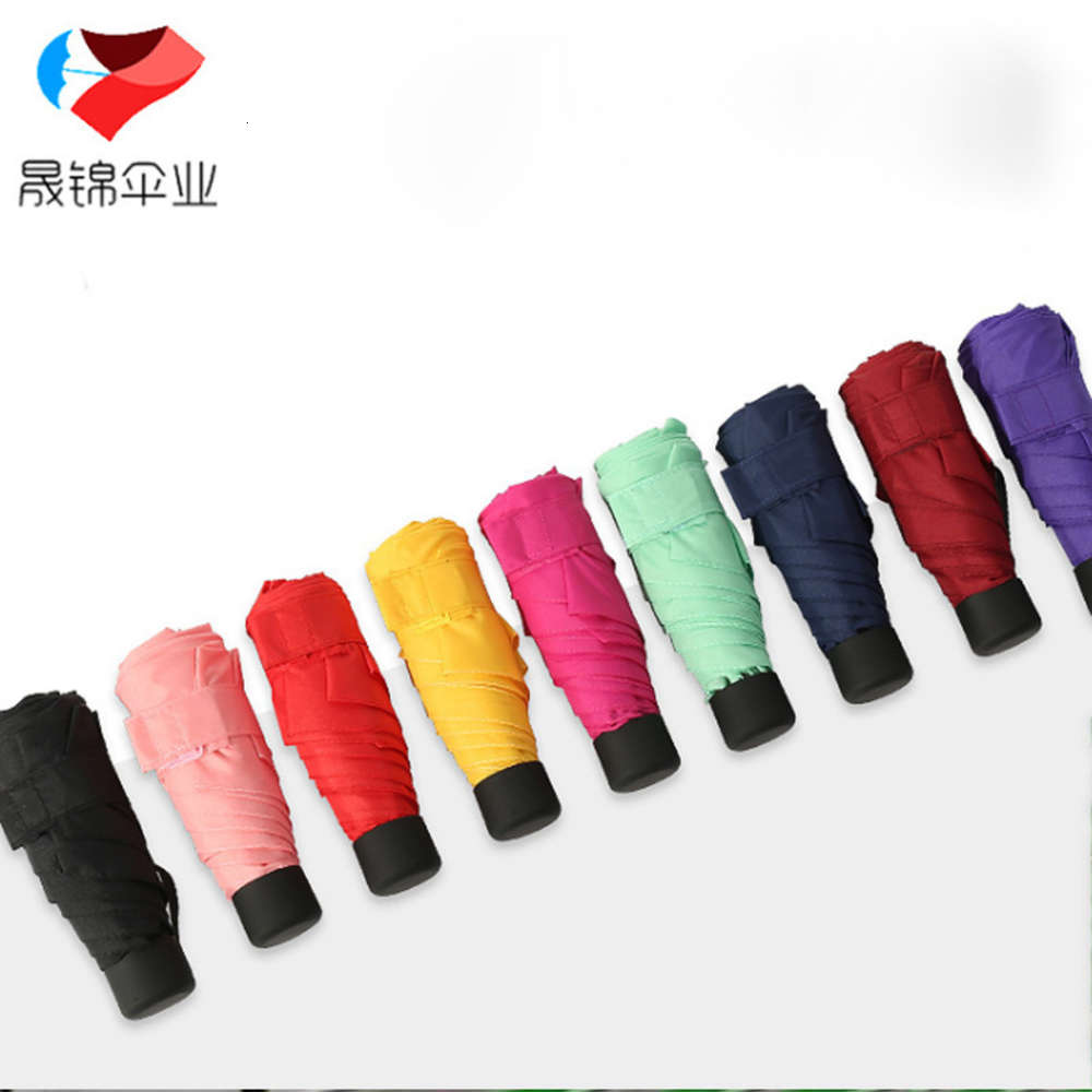 

Creative sunshade Mini capsule 50% umbrella sunscreen folding pocket sunny rain