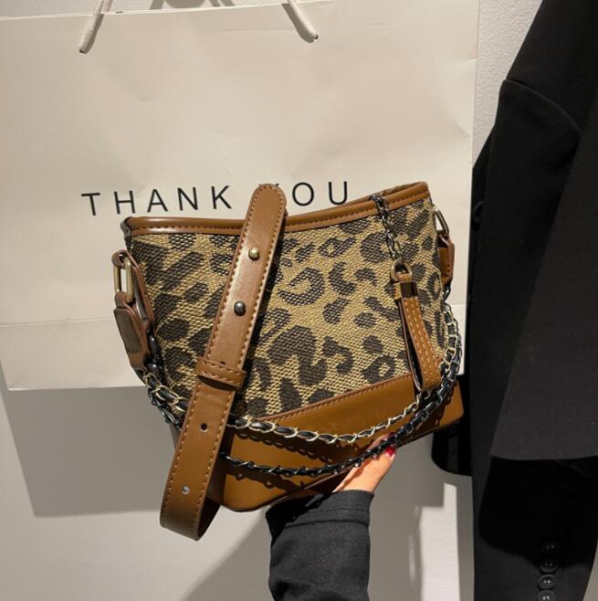 

Wholesale simple atmospheric plaid shoulder bags retro color matching leather handbags street personality Leopard slung bucket bag sweet checkered women handbag, Brown11-small(boutique box)