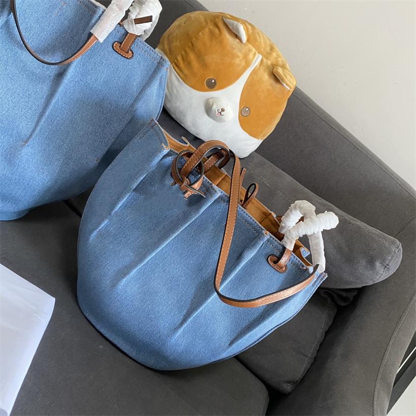 

2021 denim lining matchs withs the aureate suede shopping bags leather handbags with a solid base and soft half