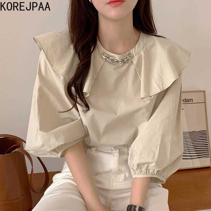 

Korejpaa Women Shirt Summer Korean Chic Girls Niche Temperament Lotus Leaf Collar Metal Chain Decoration Puff Sleeve Blouse 210526, White