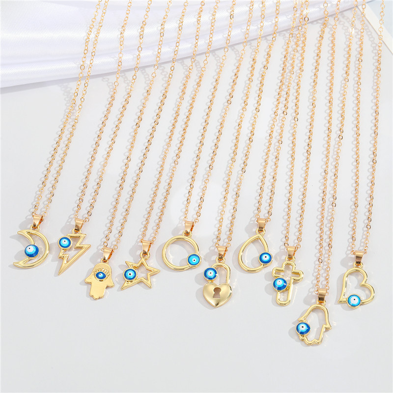 

Wholesale Creative Geometric Cross Hollow Blue Eyes Clavicle Chain Necklace Devil's Eye Pendant Necklaces