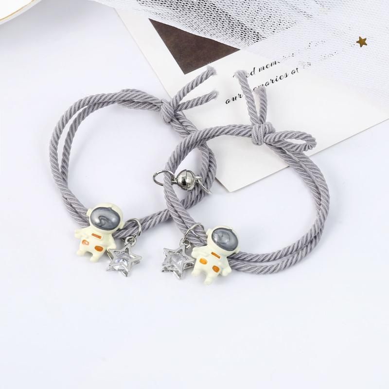 

Charm Bracelets Korean Fashion Cartoon Astronaut Spaceman Magnetic Bungee Couple Bracelet For Girls Friendship Womens Party Jewelry Set, Golden;silver